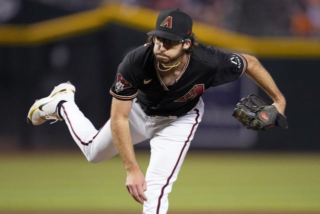 Arizona Diamondbacks' Daulton Varsho celebrates his three-run home run  against the San Francisco Giants during the eighth inning of a baseball  game Tuesday, July 5, 2022, in Phoenix. (AP Photo/Ross D. Franklin