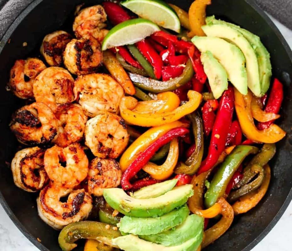 <p>Sims Home Kitchen</p><p>A low-carb Cajun Shrimp Fajita Pan with a spicy twist. This keto and paleo skillet meal includes creamy avocado chunks and tangy lime. And, it’s ready in under 30 minutes.</p><p><strong>Get the recipe: <a href="https://simshomekitchen.com/cajun-shrimp-fajita-pan-recipe/" rel="nofollow noopener" target="_blank" data-ylk="slk:Cajun Shrimp Fajita Pan Recipe;elm:context_link;itc:0;sec:content-canvas" class="link rapid-noclick-resp">Cajun Shrimp Fajita Pan Recipe</a></strong></p>