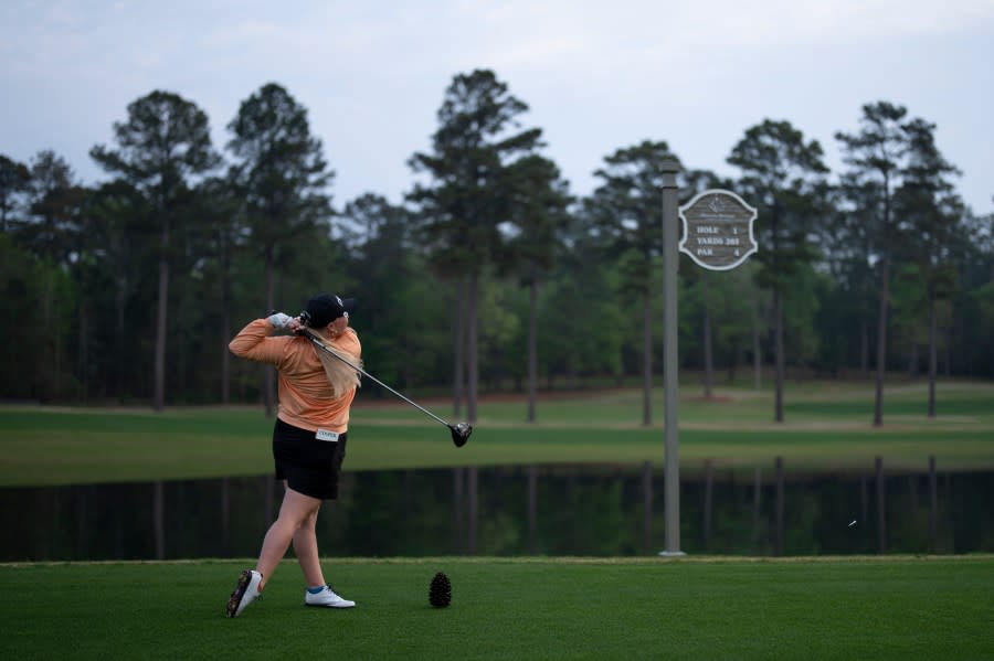Hailee Cooper of the United States plays her stroke from the No. 1 tee during a practice round prior to the Augusta National Women’s Amateur at Champions Retreat Golf Club, Tuesday, April 2, 2024.