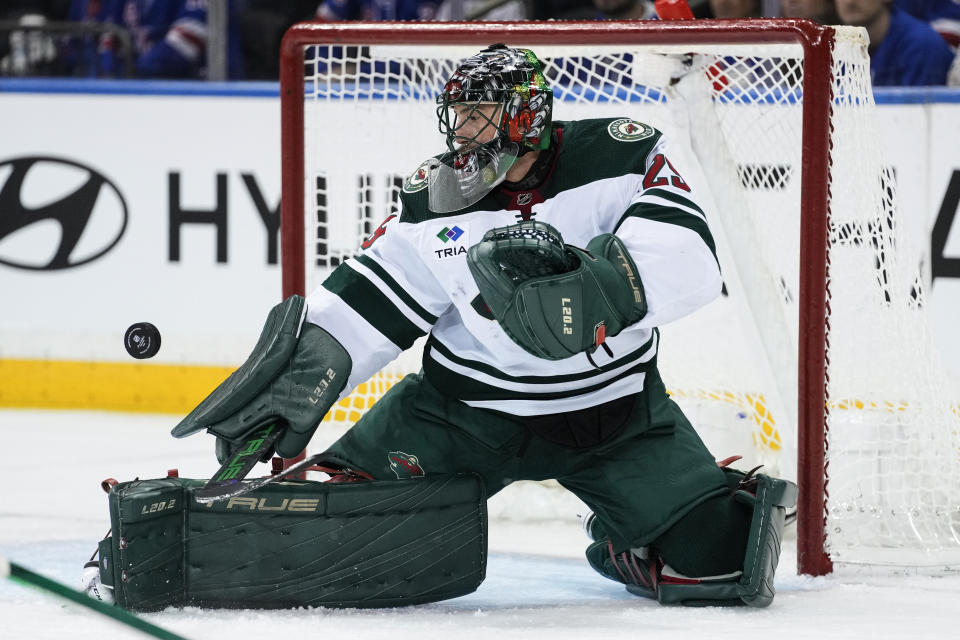 Minnesota Wild goaltender Marc-Andre Fleury stops a shot on goal during the first period of an NHL hockey game against the New York Rangers, Thursday, Nov. 9, 2023, in New York. (AP Photo/Frank Franklin II)