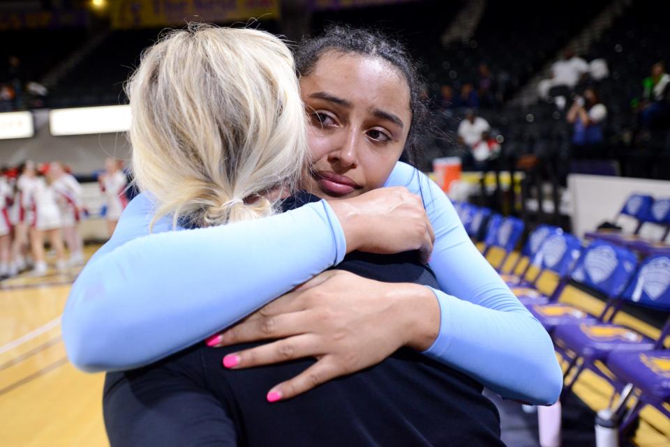 USJ's Haylen Ayers (20) embraces her mother Ashley as the USJ Lady Bruins win the 2024 BlueCross Girls Division II Class A State Championship match between Goodpasture and USJ in Hooper Eblen Center in Cookeville, Tenn., on Saturday, Mar. 2, 2024.