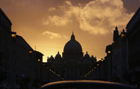 FILE PHOTO: Saint Peter's Basilica at the Vatican is silhouetted during sunset in Rome, March 11, 2013. REUTERS/Paul Hanna