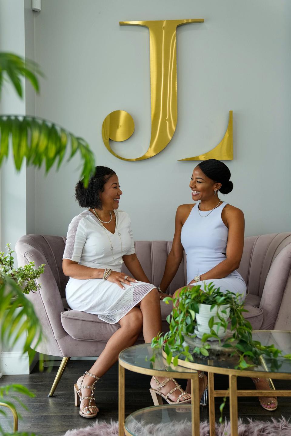 Joann Carter and her daughter Ashley Perryman pose for a photo at their family's business, Jewelry Lady fine diamond jewelry shop, on Thursday, June 16, 2022, in Indianapolis. Carter opened the shop in 2007 and Perryman is general manager. 