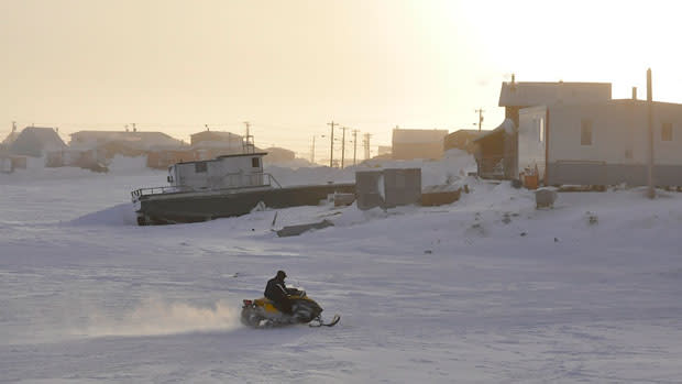 Tuktoyaktuk’s harbour freezes over in the winter months, but that ice and the ice road that leads to Tuk disappear each year when summer returns. (CBC)
