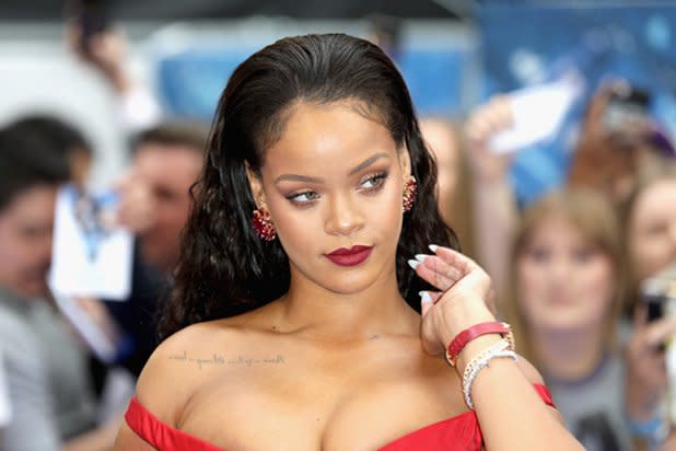 Rihanna Gives - Lawsuit Says ESPN Employees Asked Aloud What Rihanna 'Tastes Like,'  'Openly' Watched Porn