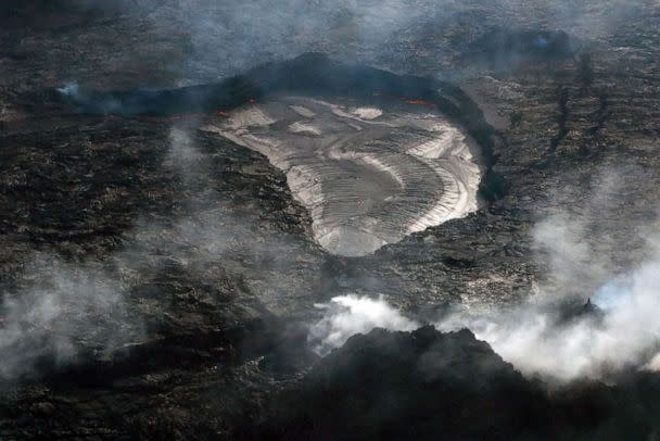 PHOTO: A handout photo made available by the US Geological Survey shows a telephoto view of the lava lake within Halema'uma'u crater taken from the west rim and looking east in the morning, at Mount Kilauea on Hawaii, Nov. 23, 2022. (USGS via EPA via Shutterstock, FILE)