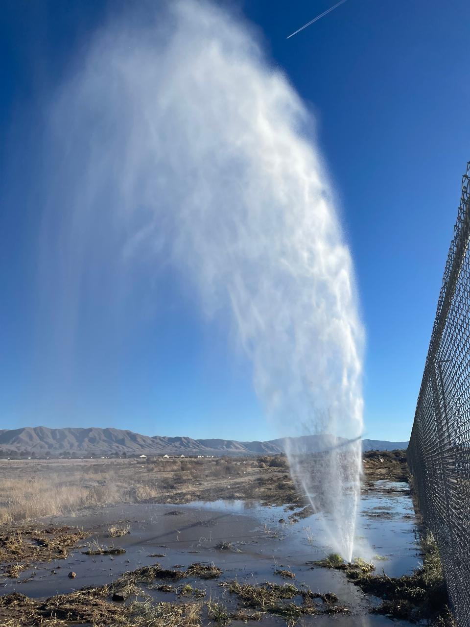 Thousands of residents were drawn to the sight of water spewing high into the air from a broken water line near a shopping center in Hesperia. Many described the sight as a "geyser" or "water fountain," which created a rainbow.