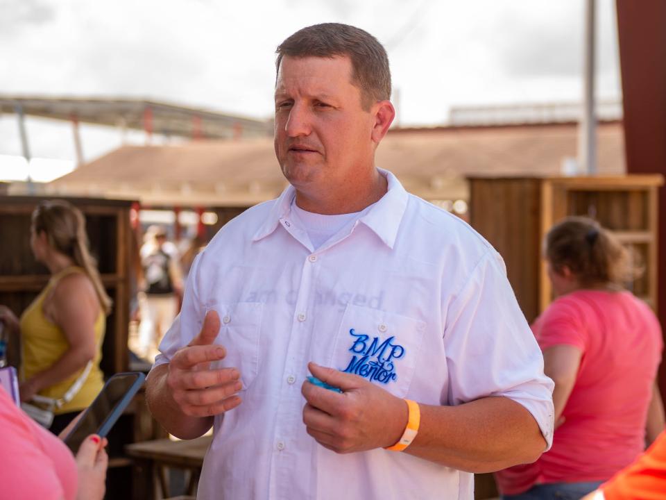 Wayne Guidry speaks about his crafts as The Louisiana State Penitentiary held the Angola Prison Rodeo after a two year halt because of the pandemic Saturday, April 23, 2022. In addition to participating in the rodeo, incarcerated people can sell their crafts.