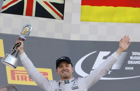 Formula One - Russian Grand Prix - Sochi, Russia - 1/5/16 - Mercedes F1 driver Nico Rosberg of Germany holds his trophy after the Russian Grand Prix. REUTERS/Maxim Shemetov