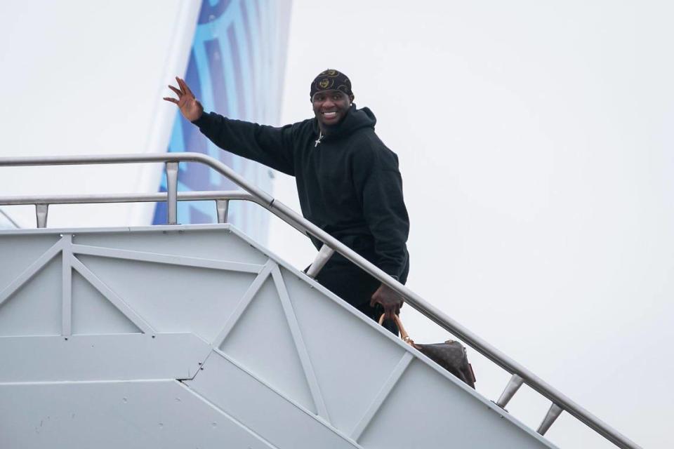 Kansas City Chiefs linebacker Willie Gay waves toward the media while boarding a chartered United flight on their way to Las Vegas for Super Bowl LVIII on Sunday February 4, 2024 at KCI Airport in Kansas City, Missouri.