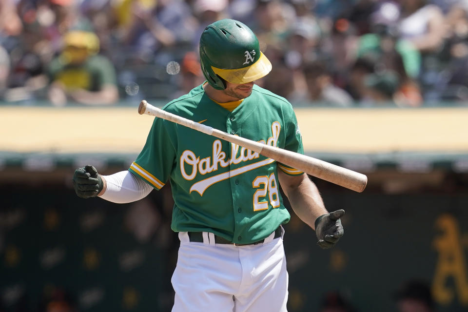 Oakland Athletics' Matt Olson reacts after striking out against the San Francisco Giants during the fourth inning of a baseball game in Oakland, Calif., Sunday, Aug. 22, 2021. (AP Photo/Jeff Chiu)