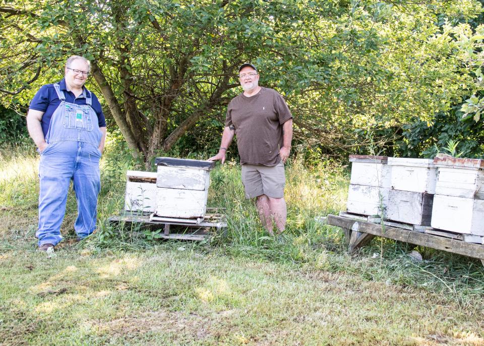 Brothers Mark and Chris Lewis together own Pap’s Hilltop Honey in Bainbridge, Ohio. 