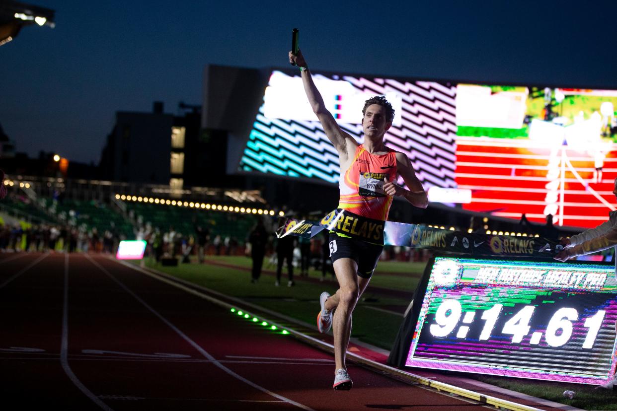 Henry Wynne crosses the finish line to set the world record in the distance medley relay during the Oregon Relays Friday, April 19, 2024, at Hayward Field in Eugene, Ore.