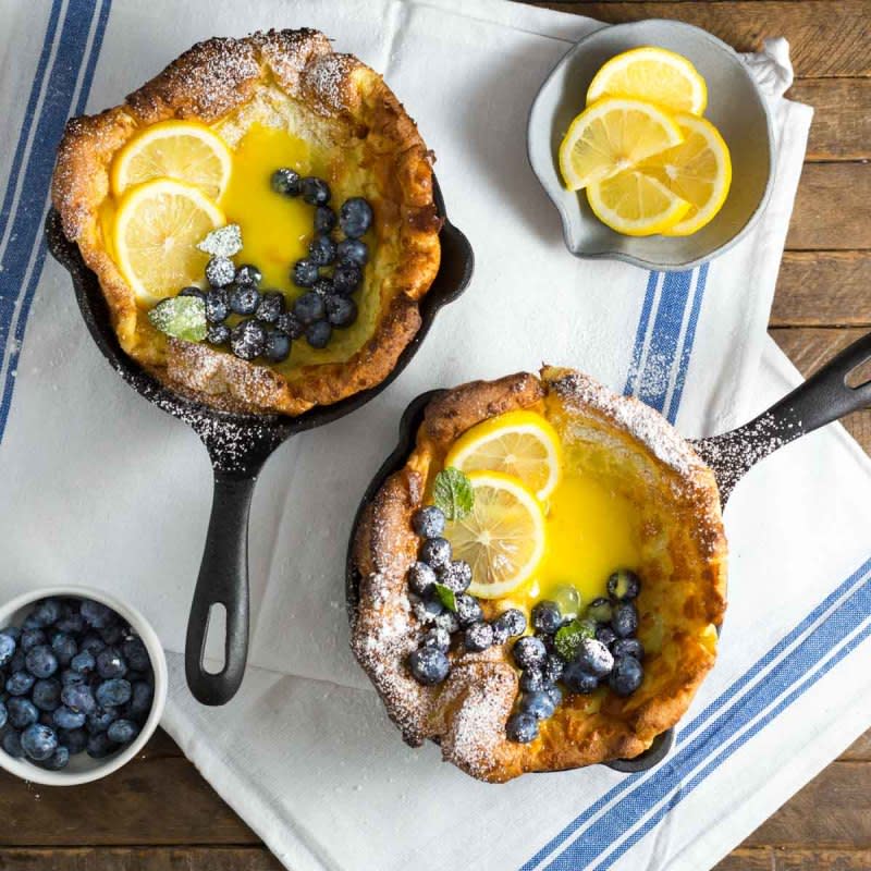 <p>These mini Dutch baby pancakes are puffy and beautifully golden brown. They’re just right for breakfast, brunch or dessert.</p><p><a href="http://nerdswithknives.com/dutch-baby-lemon-curd-blueberry/" rel="nofollow noopener" target="_blank" data-ylk="slk:Get the recipe here!;elm:context_link;itc:0;sec:content-canvas" class="link rapid-noclick-resp"><em><strong>Get the recipe here!</strong></em></a></p>