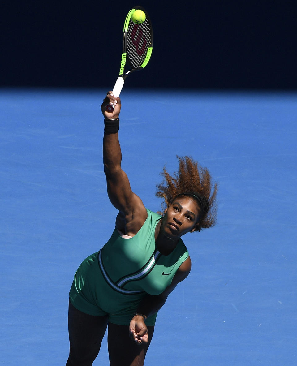 United States' Serena Williams serves to Ukraine's Dayana Yastremska during their third round match at the Australian Open tennis championships in Melbourne, Australia, Saturday, Jan. 19, 2019. (AP Photo/Andy Brownbill)