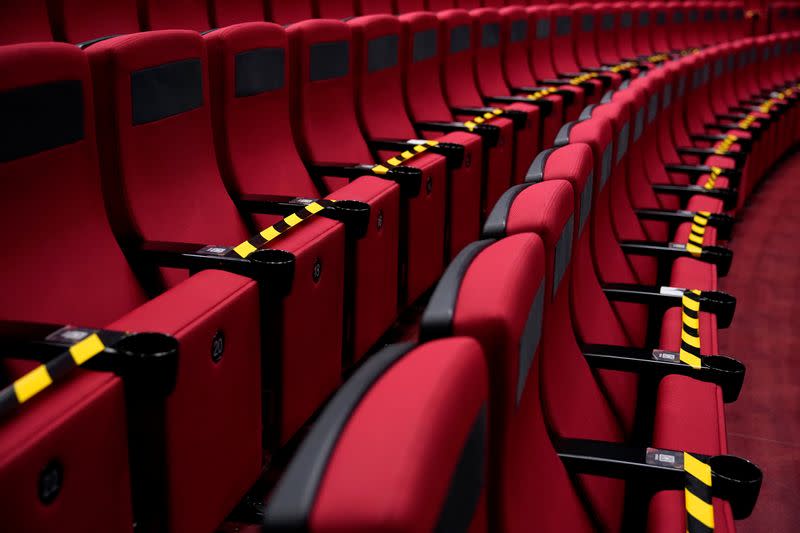 Seats are taped in order to maintain social distancing at a theatre where the Cirque du Soleil "The Land of Fantasy" show is held, in Hangzhou