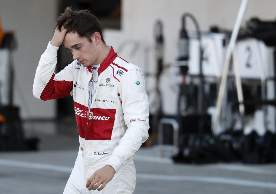 Sauber driver Charles Leclerc of Monaco walks on the pit lane after retiring the race of the Japanese Formula One Grand Prix at the Suzuka Circuit in Suzuka, central Japan, Sunday, Oct. 7, 2018. (Issei Kato/Pool Photo via AP)