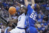 Seton Hall guard Al-Amir Dawes (2) goes to the basket against Creighton guard Baylor Scheierman (55) during the second half of an NCAA college basketball game, Wednesday, Feb. 8, 2023, in Newark, N.J. Creighton won 75-62. (AP Photo/Mary Altaffer)