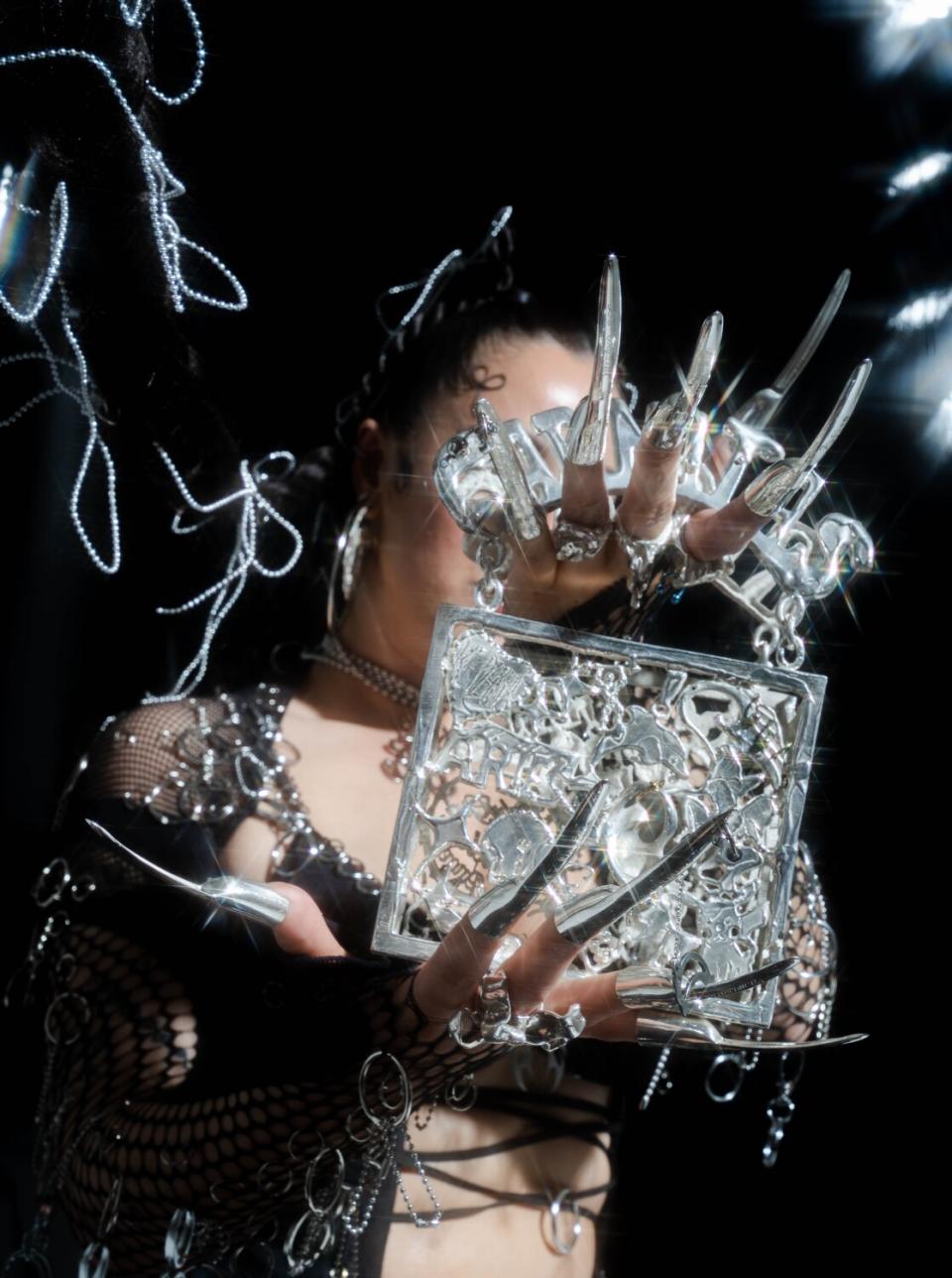 Photo of "KEPERRA" — a sterling silver casted purse made by Georgina Treviño for Image magazine.