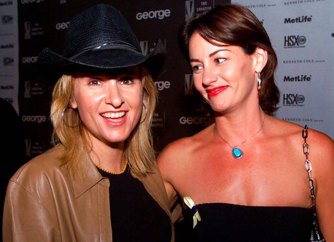 Melissa Etheridge, left, and her partner Julie Cypher, shortly before they split up in 2000.