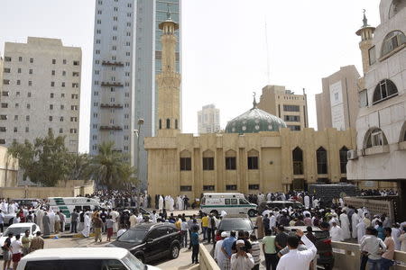 Ambulances park in front of the Imam Sadiq Mosque after a bomb explosion following Friday prayers, in the Al Sawaber area of Kuwait City June 26, 2015. REUTERS/Jassim Mohammed