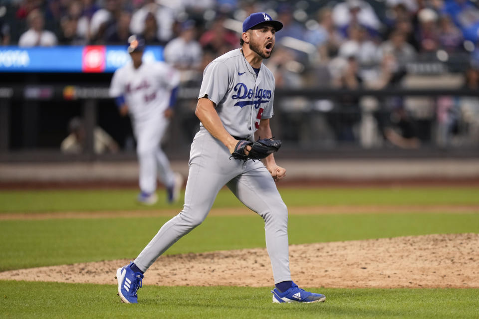 Los Angeles Dodgers relief pitcher Alex Vesia reacts after the final out of the eighth inning of a baseball game against the New York Mets at Citi Field, Sunday, July 16, 2023, in New York. (AP Photo/Seth Wenig)