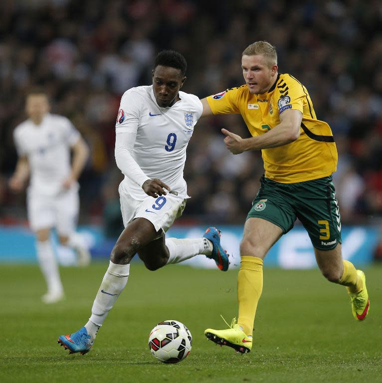 England's striker Danny Welbeck (L) vies for the ball against Lithuania's Georgas Freidgeimas during a Euro 2016 Group E qualifying football match in north London on March 27, 2015