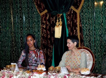 Malia Obama (L) and Princess Lalla Meryem of Morocco attend an Iftar dinner at the royal palace in Marrakech, June 28, 2016. REUTERS/Youssef Boudlal