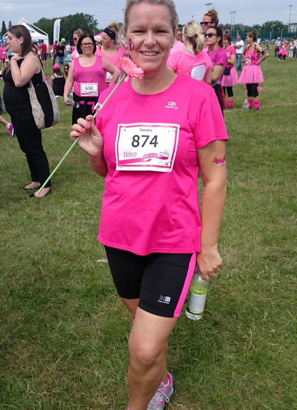 Sandra Greene doing exercise for breast cancer charity. (SWNS)