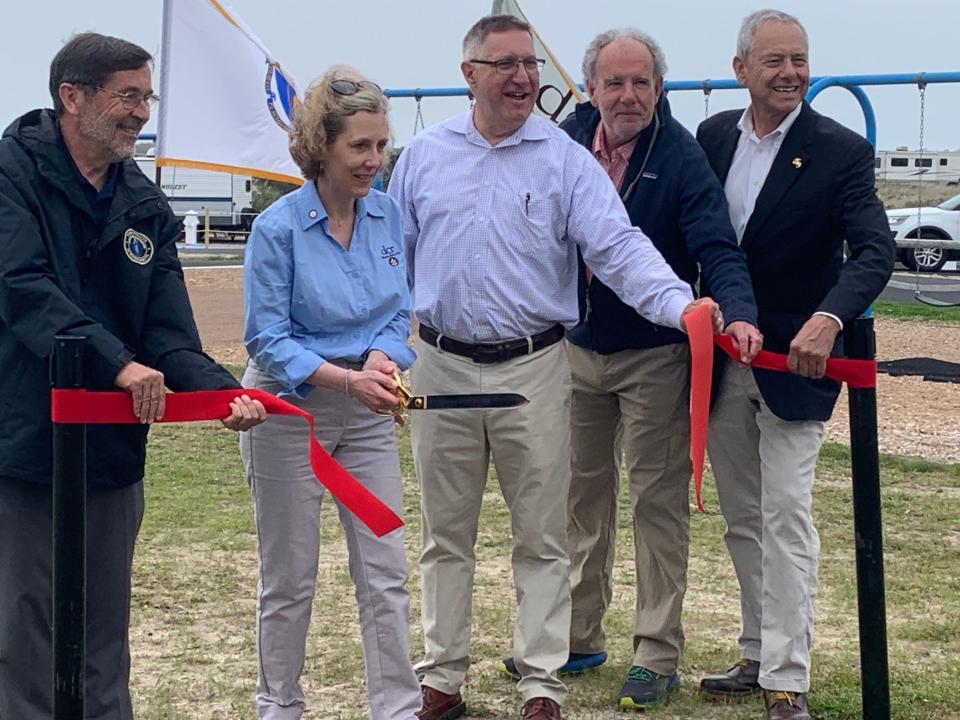 Rep. James Hawkins, Acting DCR Commissioner Stephanie Cooper, Sen. Michael Rodrigues, DCR Stewardship Council Chairman Jack Buckley and Rep. Paul Schmid celebrate Horseneck Beach State Reservation improvements.