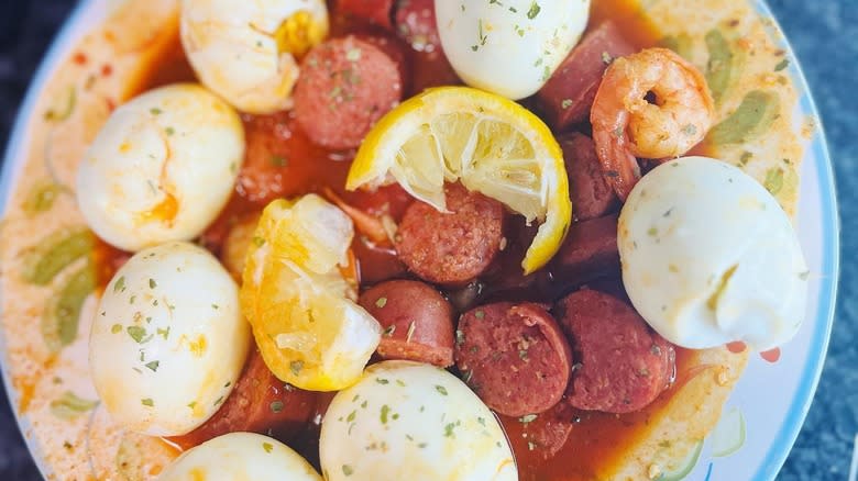 Cajun egg boil with sausage and shrimp