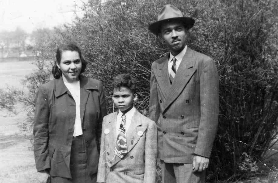 In 1952, Louise Burwell Miller, left,  shown with her husband Luther Miller, right, sued Washington D.C.'s Board of Education on behalf of her son Kenneth, center, to prevent him and other Black deaf children from being sent away to attend segregated public schools in neighboring states. She and other parents in the lawsuit won and a school for local Black deaf children was established at Gallaudet University in 1953. Gallaudet is creating a memorial in her honor.