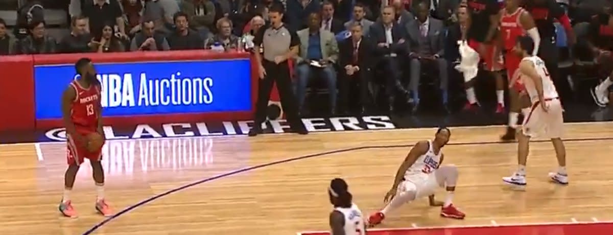 James Harden looks down on his works while Wesley Johnson despairs. (Screencap via NBA)