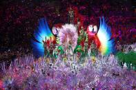 <p>Samba dancers perform in the “Cidade Maravilhosa” segment during the Closing Ceremony on Day 16 of the Rio 2016 Olympic Games at Maracana Stadium on August 21, 2016 in Rio de Janeiro, Brazil. (Photo by Patrick Smith/Getty Images) </p>