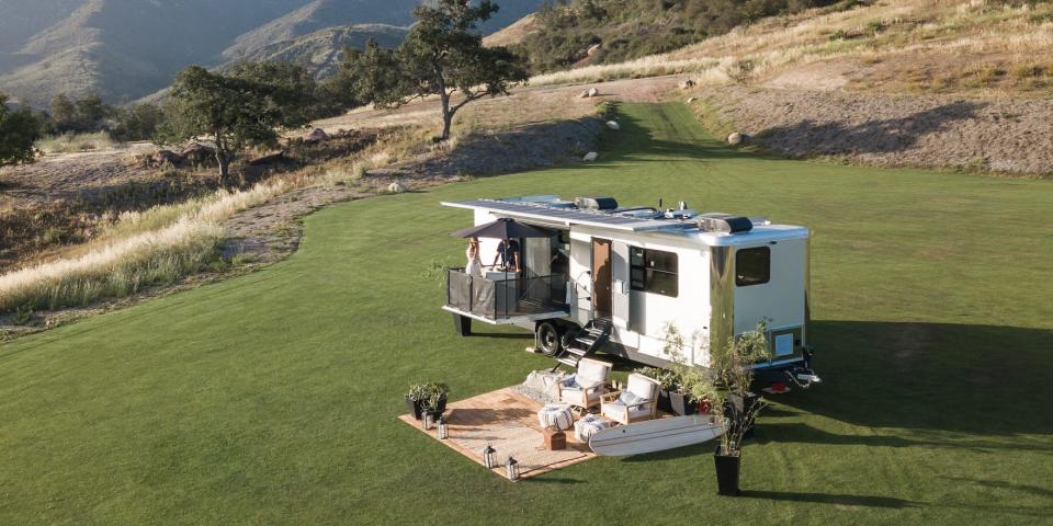 the 2022 Living Vehicle trailer outside on a patch of grass