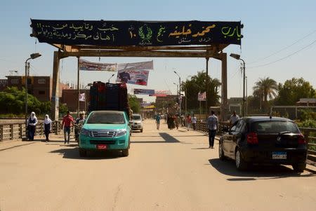 An election banner for parliamentary candidate Mohamed Khalifa is seen in Minya governorate, south of Cairo, Egypt, October 8, 2015. REUTERS/Stringer