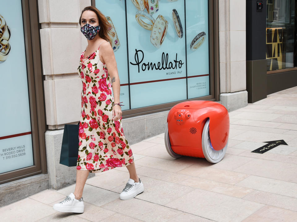 <p>Taryn Manning steps out in L.A. with her helpful gita robot trailing close behind. </p>