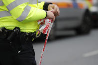 <p>A police officer holds cordon tape near Parsons Green subway station in London, Friday, Sept. 15, 2017. (Photo: Frank Augstein/AP) </p>