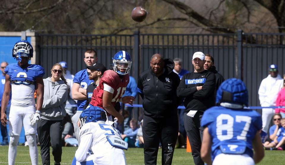 Kentucky quarterback  Destin Wade throws the ball to Josh Terrell during open practice for the fans on April 1. He entered the transfer portal Dec. 4.