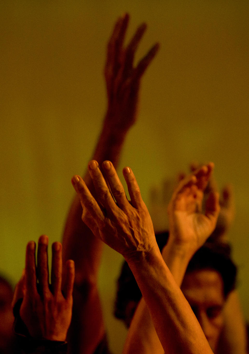 In this Dec. 4, 2018 photo, dancers perform in the contemporary dance production Ubuntu, at the Teresa Carreno Theater in Caracas, Venezuela. Caracas based AM Danza works with 50 young Venezuelans who are pursuing their passion for dance despite limitations like broken spines, cerebral palsy, Down syndrome or blindness. (AP Photo/Fernando Llano)