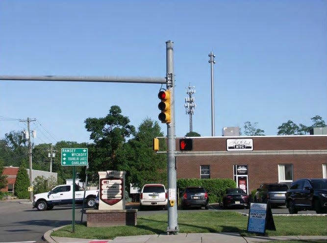 Simulated view of two Allendale cell towers if proposed second was installed.  View is facing west at intersection of West Crescent Avenue and Myrtle Avenue.