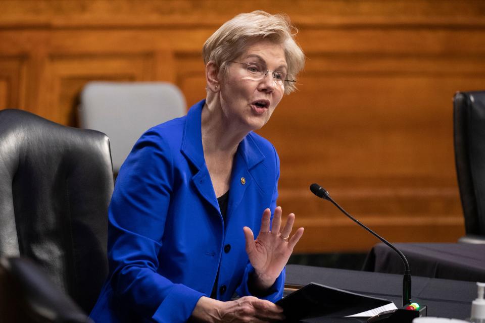 Democratic Senator from Massachusetts Elizabeth Warren directs a question toward Xavier Becerra during the Senate Finance Committee hearing on Becerra's nomination to be secretary of Health and Human Services (HHS), on Capitol Hill in Washington, DC, February 24, 2021. - If confirmed, Becerra would be the first Latino secretary of HHS. (Photo by MICHAEL REYNOLDS / POOL / AFP) (Photo by MICHAEL REYNOLDS/POOL/AFP via Getty Images)