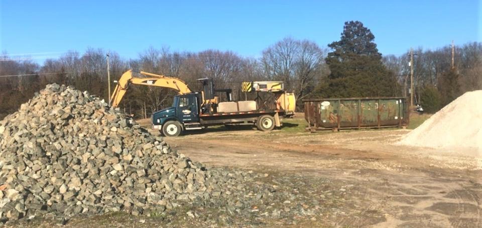 Construction equipment and material staged near the Fries Mill Road-Route 322 intersection in Monroe Township as part of an improvement project for the crossroads. PHOTO: Jan. 8, 2024.