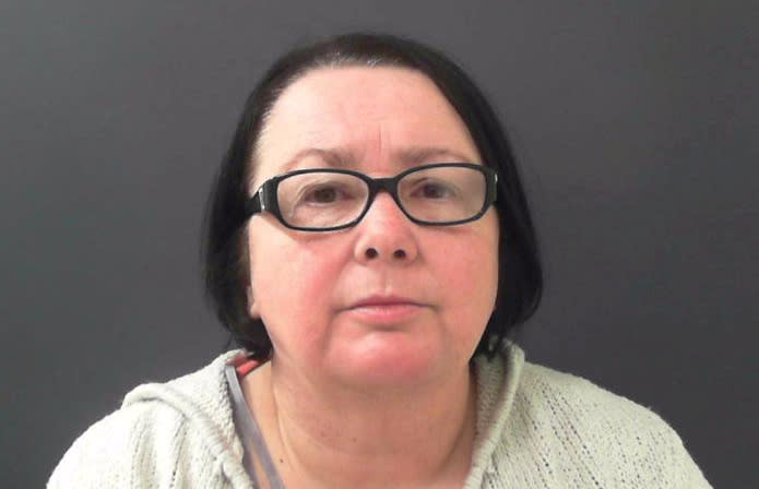 Corina Lyons conned a woman in her care out of £18,000. (SWNS)