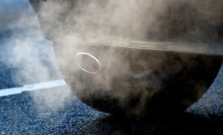 FILE PHOTO: An exhaust pipe of a car is pictured on a street in a Berlin, Germany, February 22, 2018.    REUTERS/Fabrizio Bensch/File Photo