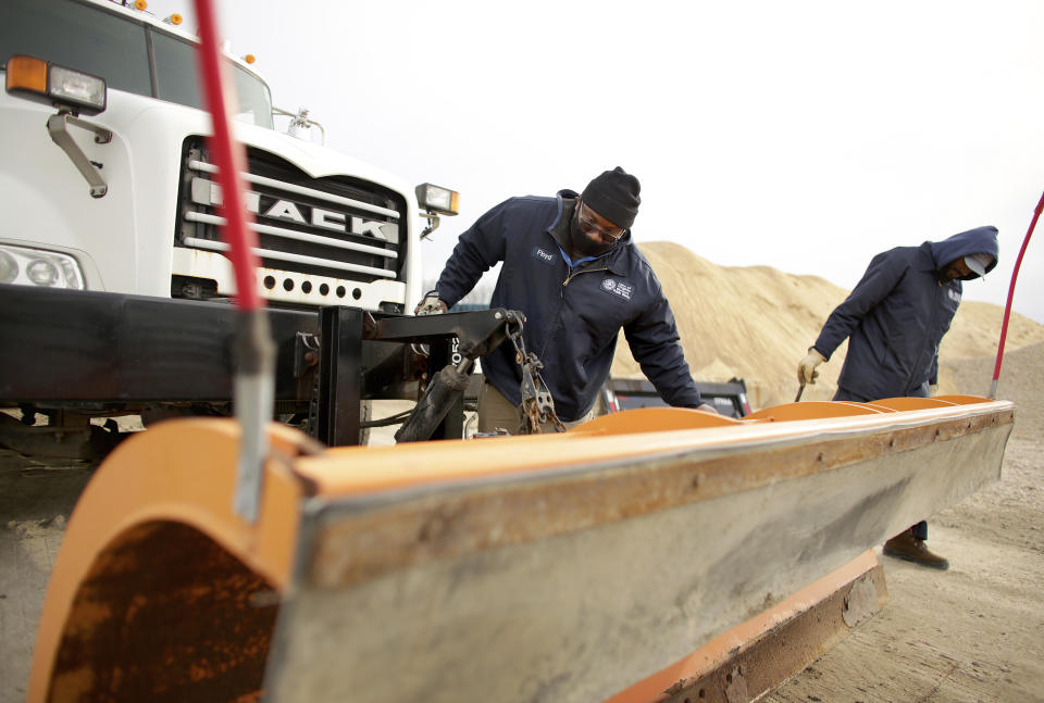 Virginia Beach, Va., Public Works crews prepare Thursday, Jan. 20, 2022, morning for snow from an impending winter storm. (Stephen M. Katz/The Virginian-Pilot via AP)