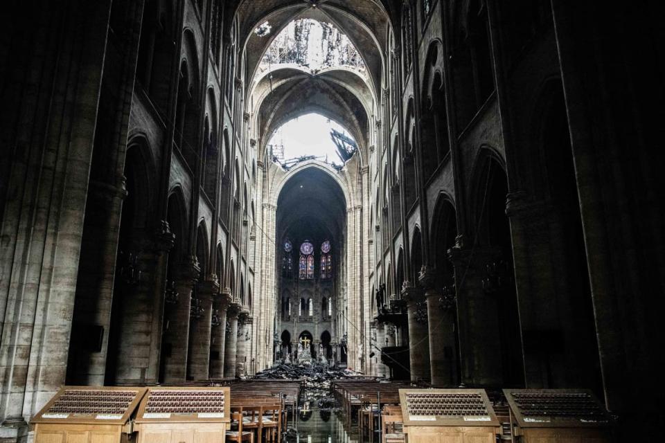 <div class="inline-image__caption"> <p>Fallen debris from the burnt out roof structure sits near the altar inside Notre Dame Cathedral in Paris, France, on Tuesday, April 16, 2019.</p> </div> <div class="inline-image__credit">Christophe Morin/Bloomberg via Getty</div>