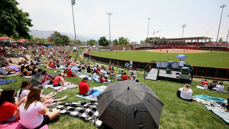 Fans watch from the outfield as the University of Utah softball team plays Ole Miss in NCAA Regional in Salt Lake City on Sunday, May 21, 2023. The Utes will host San Diego State in this week’s Super Regional in Salt Lake City.