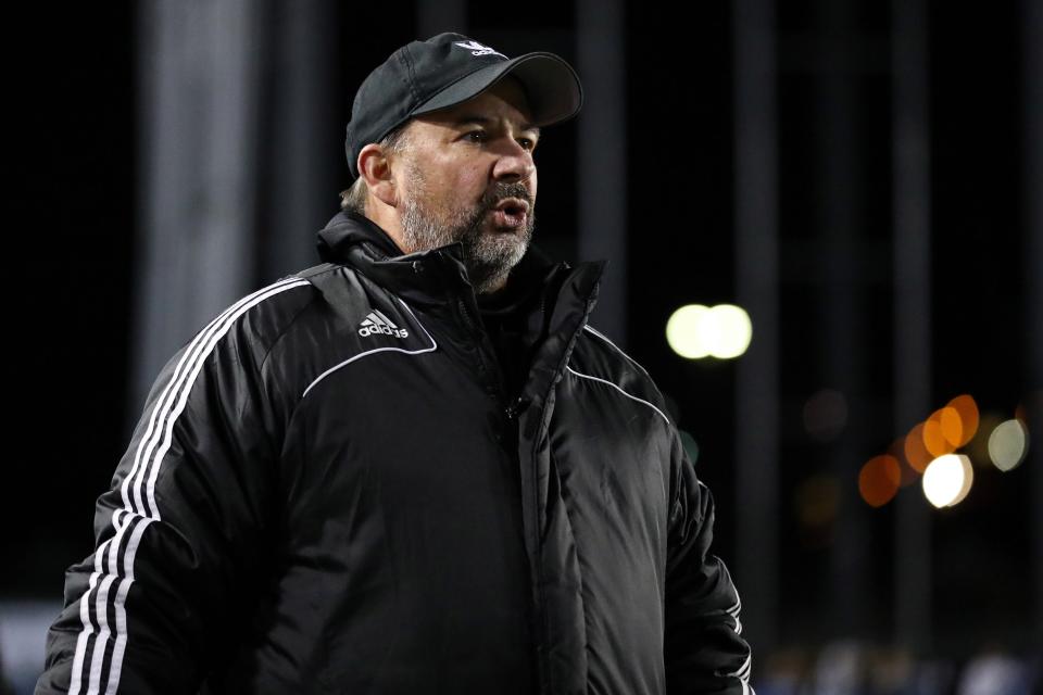 Moon head coach Bill Pfeifer looks on from the sideline in the second half against Conestoga during the PIAA Class 4A girls soccer championship, Nov. 19, 2021, at Hersheypark Stadium in Hershey. The Tigers defeated the Pioneers, 2-0. Pfeifer has been named NFSH National Girls’ Soccer Coach of the Year.