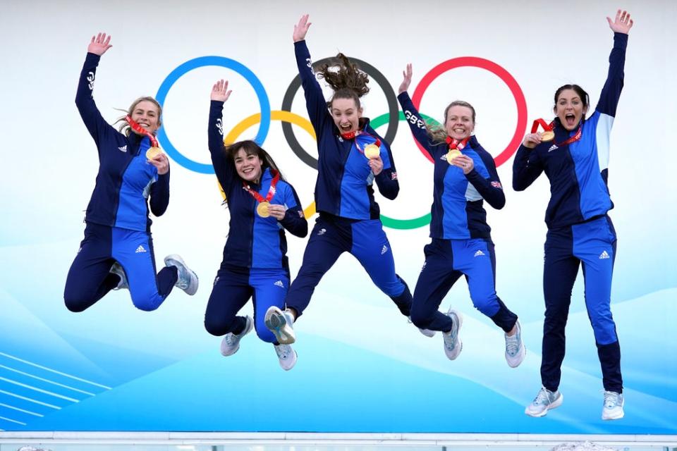 Great Britain’s Mili Smith, Hailey Duff, Jennifer Dodds, Vicky Wright and Eve Muirhead celebrate curling gold medal success at the 2022 Winter Olympic Games (Andrew Milligan/PA) (PA Wire)